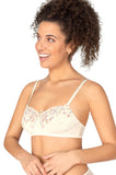 Off white floral pattern wirefree mastectomy bra by Amoena, featuring adjustable straps and center front. Size 12A.