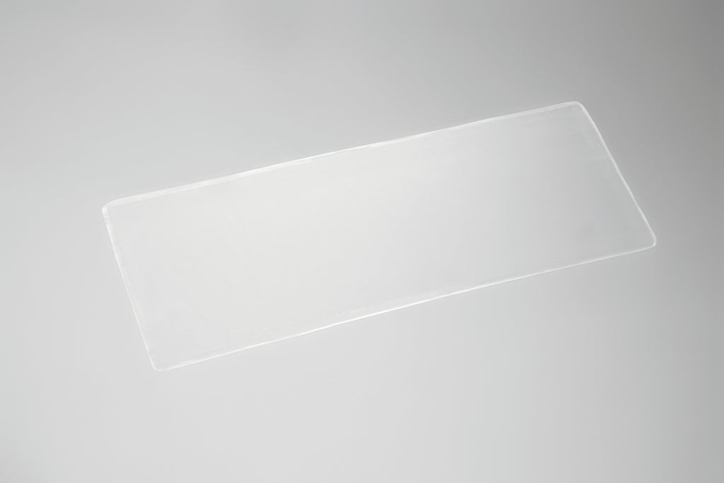Clear Squares Silicone Scar Patch by AMOENA, a transparent silicone accessory for scar treatment and skin protection.