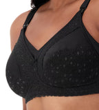 Black lace maternity nursing bra by Triumph, wire-free design with adjustable straps for comfortable breastfeeding support.