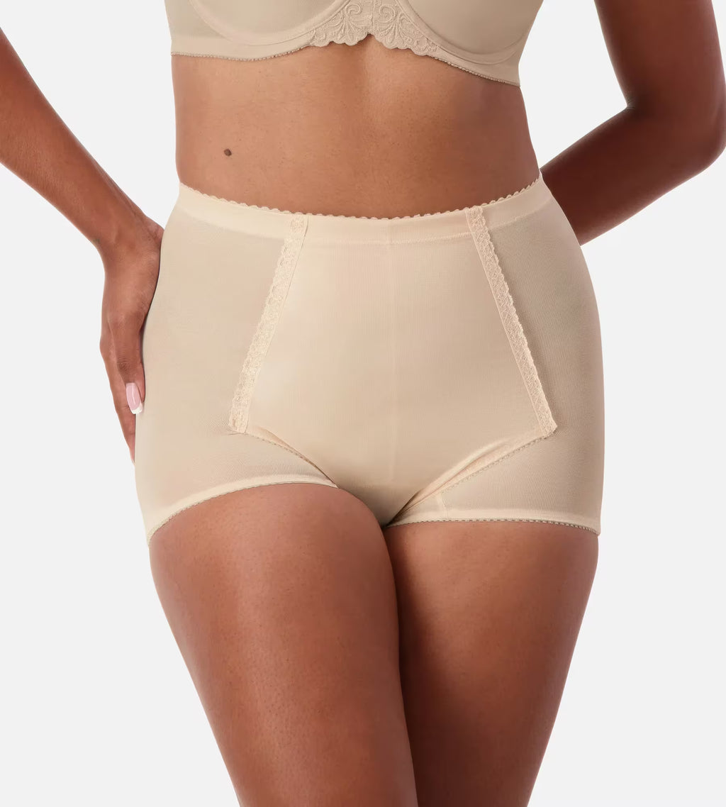 Triumph Belform Support Control Panty in skin nude, seamless underwear with shaping and comfortable fit, shown on model.