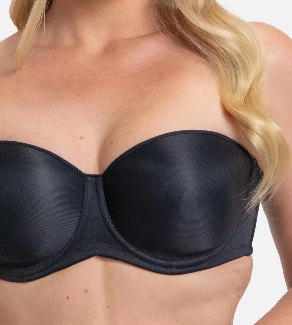 Black Triumph silhouette strapless underwire bra with smooth cups and adjustable straps, designed for support and a seamless fit.