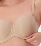 Nude Triumph silhouette strapless underwire bra with smooth cups and supportive design, perfect for strapless outfits.