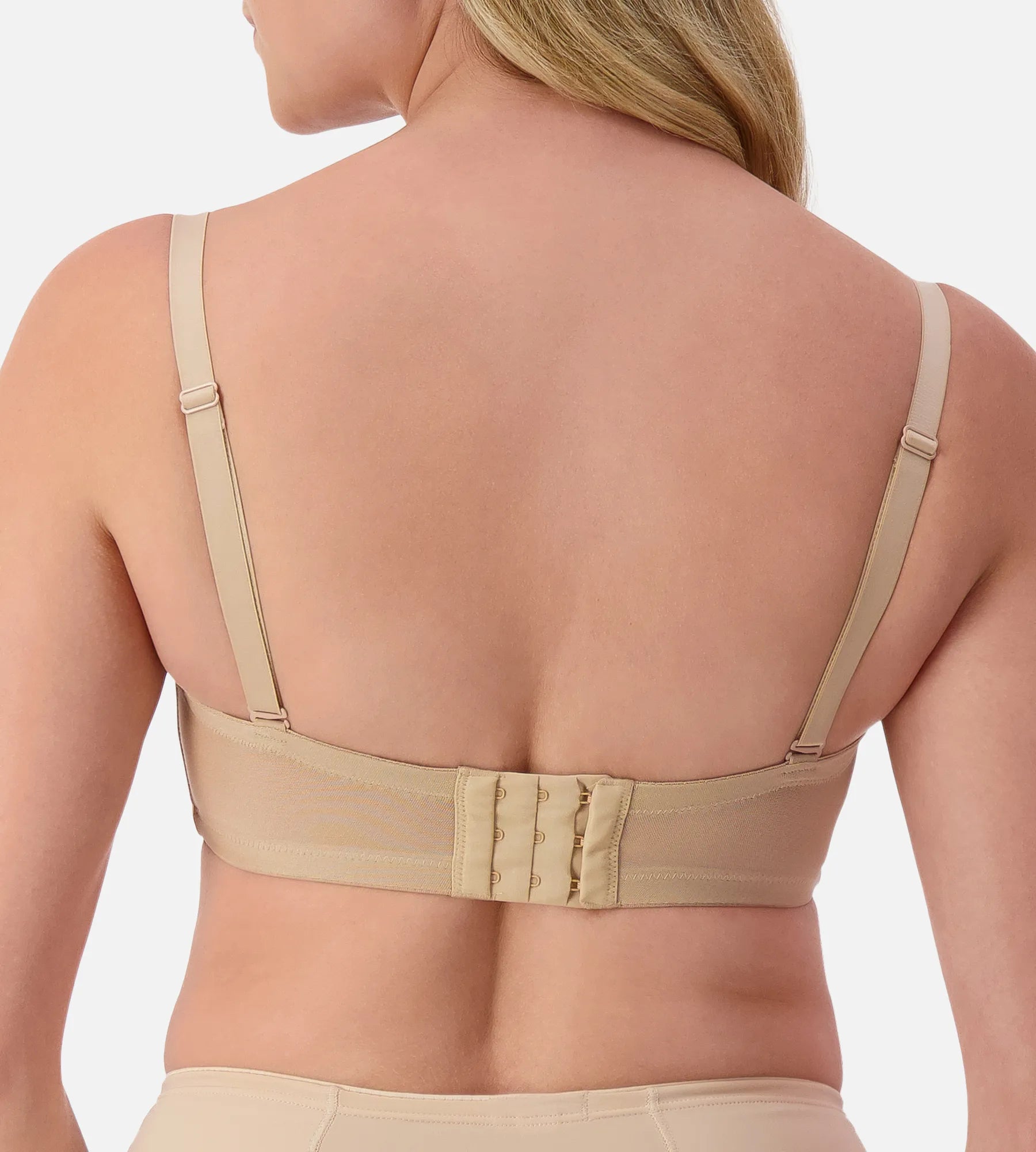 Nude silhouette strapless underwire bra by Triumph, featuring smooth cups and supportive design, perfect for seamless wear.