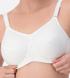 White Triaction wired sports bra by Triumph, showing front view with supportive design and adjustable straps.