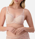 Triumph nude pink lace balconette bra with underwire, featuring delicate lace detailing and adjustable straps.