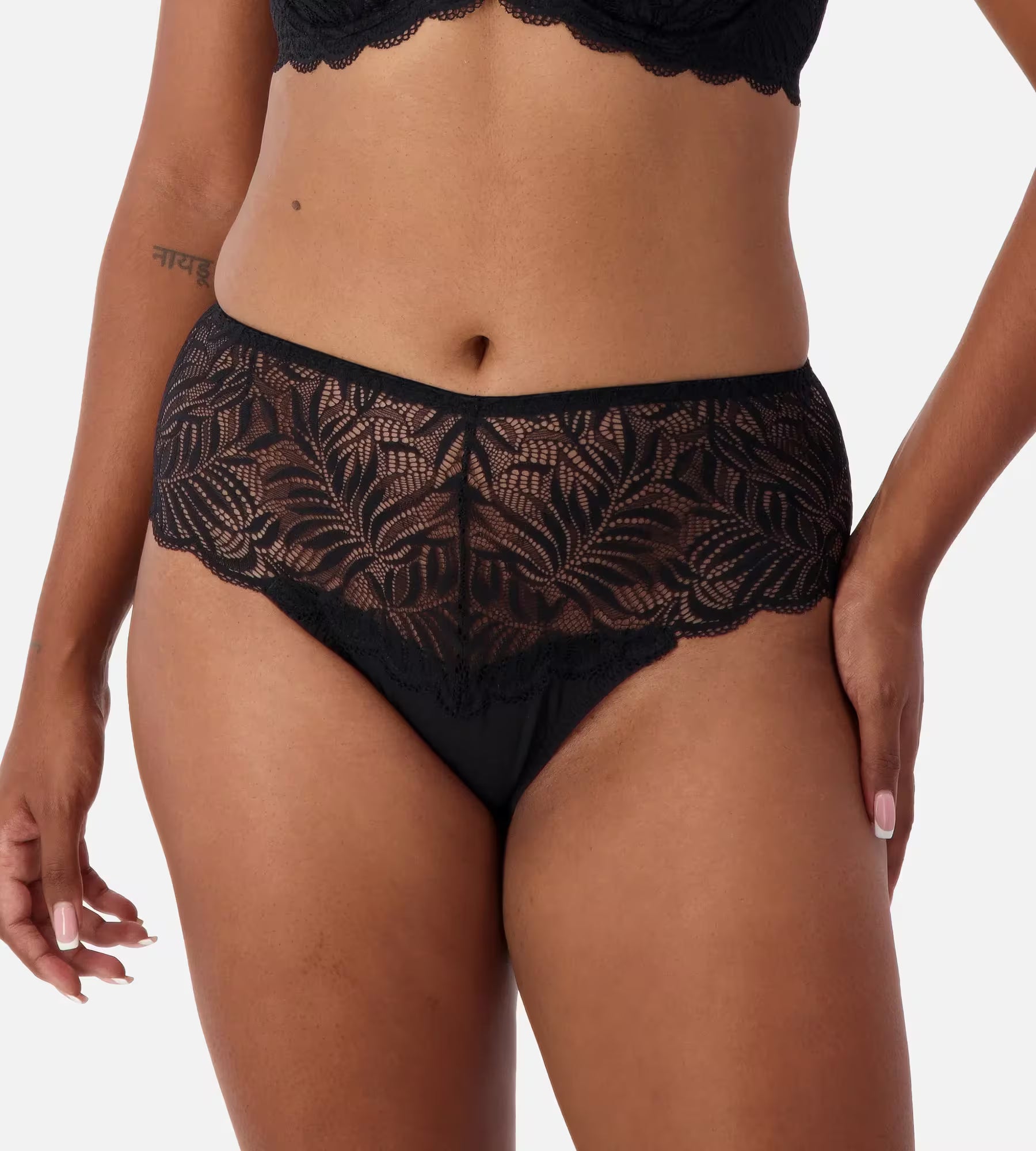 Black Triumph Essential Lace Maxi Brief underwear with full coverage, featuring delicate lace fabric and comfortable fit.