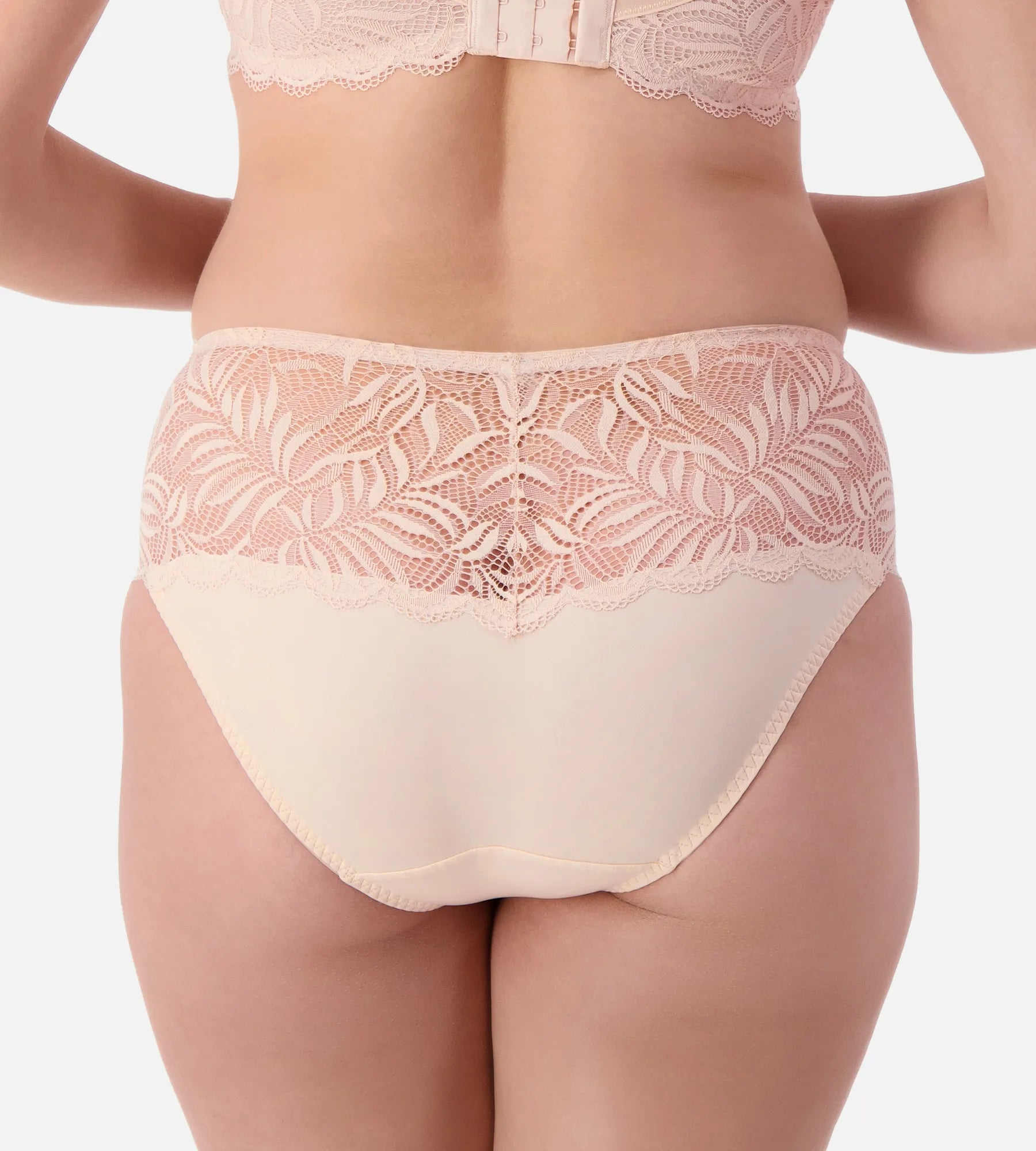 Nude pink lace maxi brief underwear by Triumph, featuring delicate lace fabric and full coverage design.