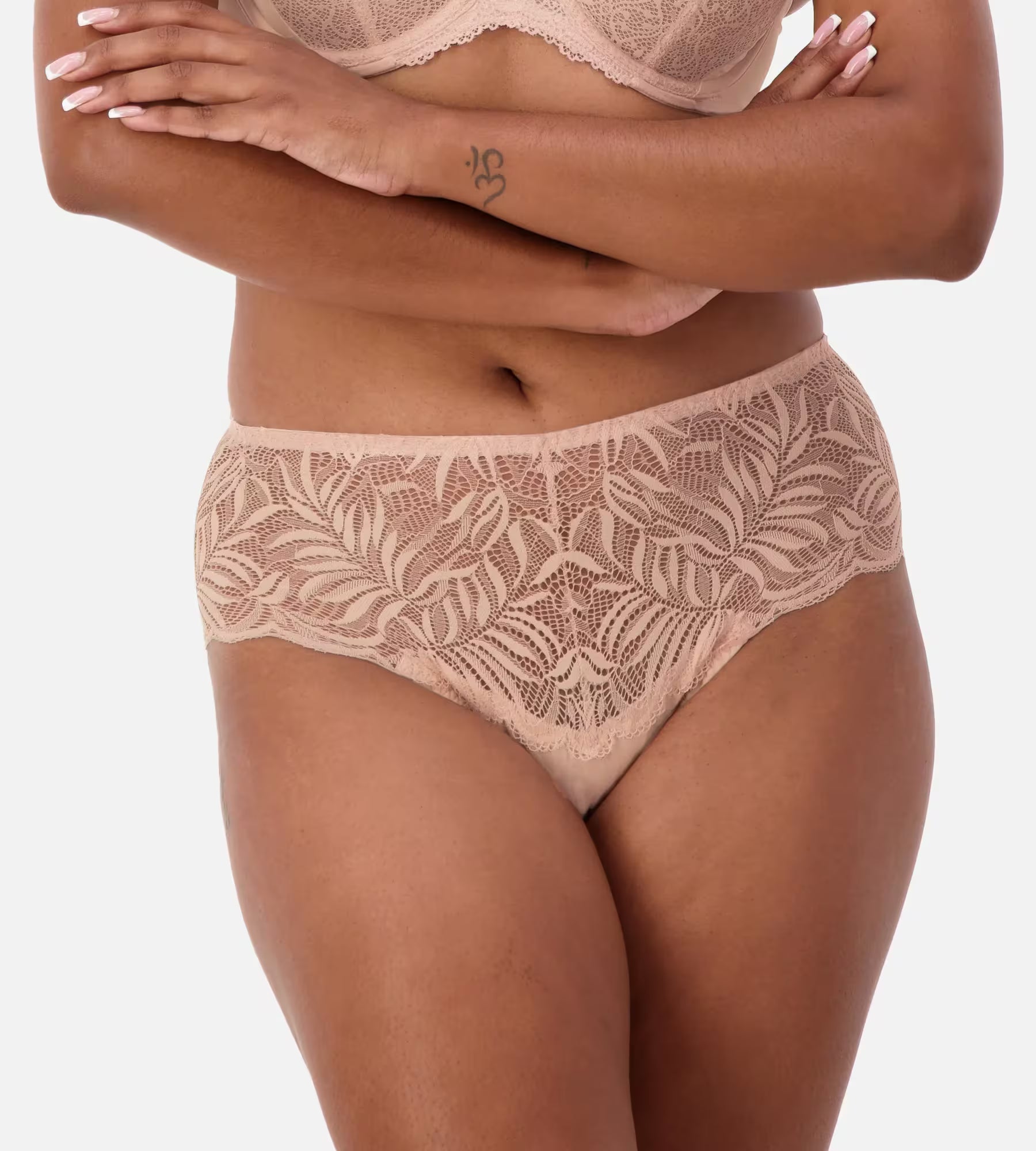 Nude pink lace maxi brief from Triumph, elegant women's underwear with intricate lace details and full coverage.