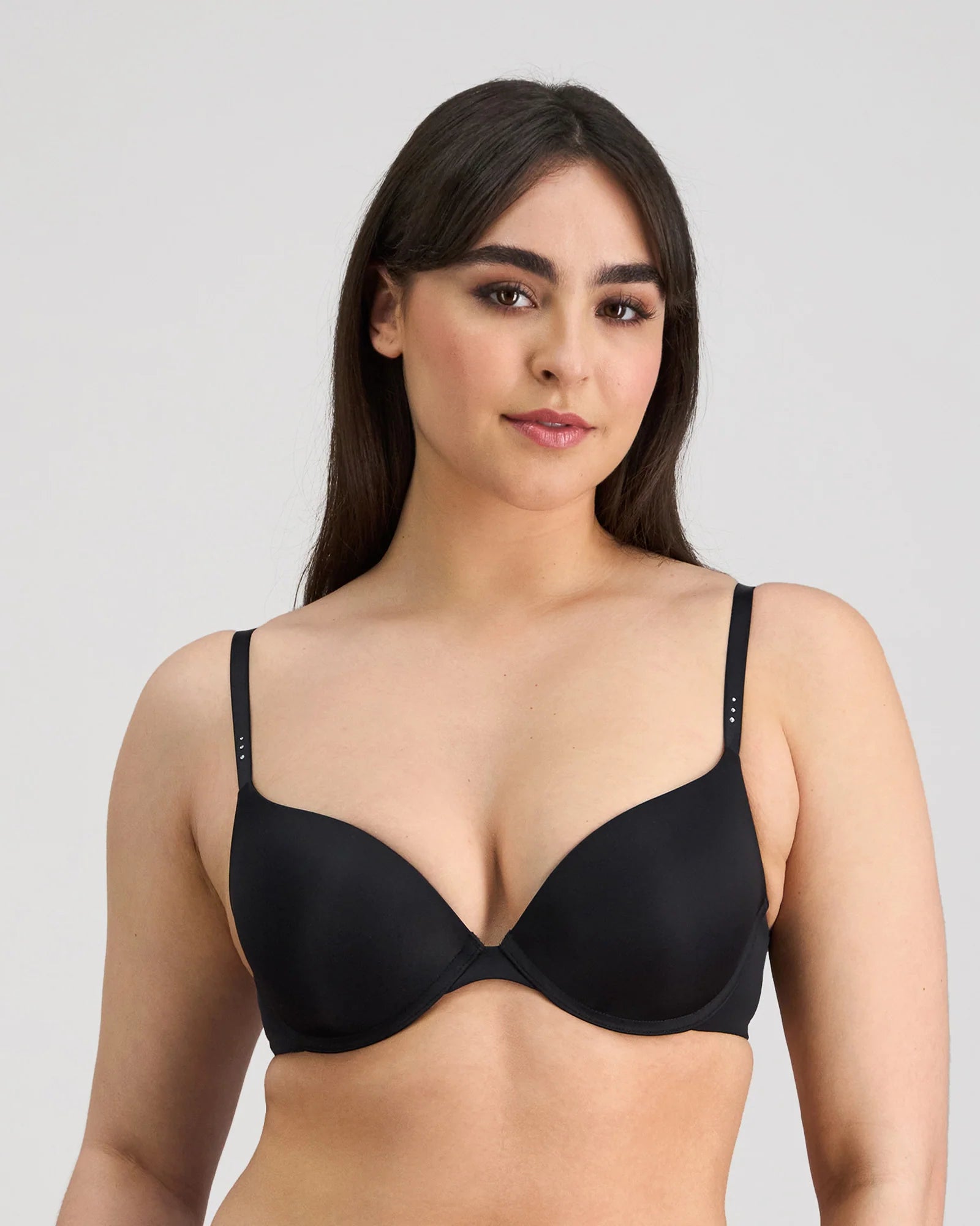 Pleasure State My Fit Smooth Push Up T-Shirt Bra showing under a fitted top, seamless design, and supportive cups.