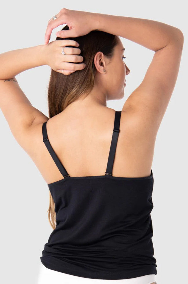 Black bamboo nursing camisole with lace details and adjustable straps, designed for leakproof comfort by Hot Milk.