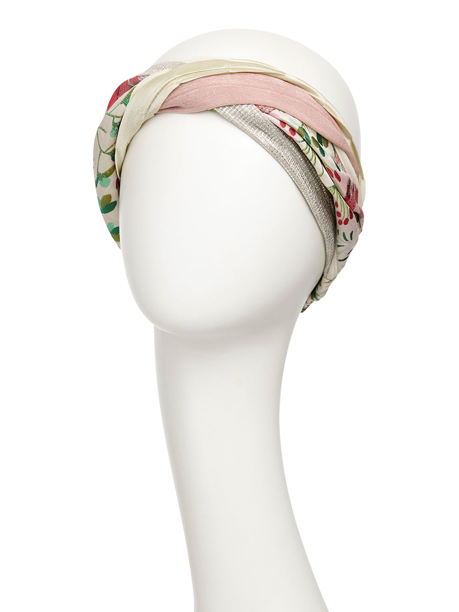 Three colorful boho turban hats by HOUSE OF CHRISTINE from the HocPerla Boho Turban Set, featuring vibrant patterns and soft fabrics.