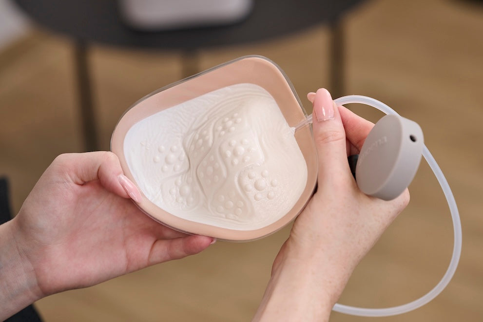 Amona Adapt Air Xtra Light 2S Ivory breast form from mastectomy range, shown with smooth shape and soft material.