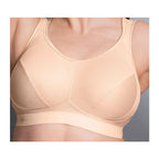 ANITA Extreme Control sports bra in desert color, offering maximum support, shown on a model for active athletic wear.