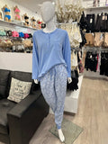 Givoni Katie Ski Pyjama sleepwear set with cozy top and pants, in a winter-themed pattern, designed for comfortable nighttime sleep.