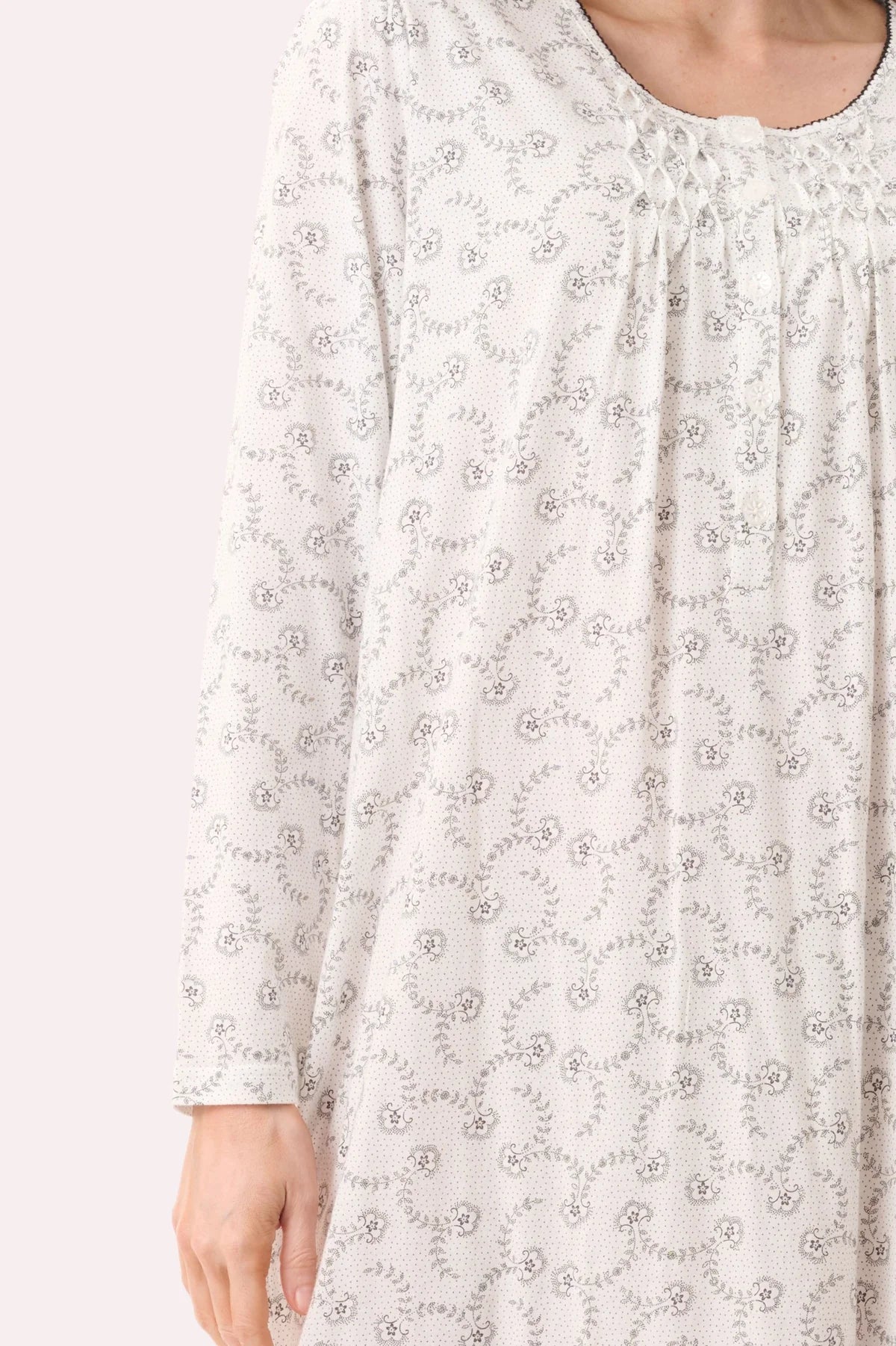 Givoni Nadia mid-length cotton nightie in ivory, sleeveless sleepwear with soft fabric and relaxed fit, displayed on a hanger.