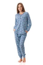 Givoni Jada Ski Pyjama sleepwear set, front view showing cozy fabric and ski-themed design in soft colors.
