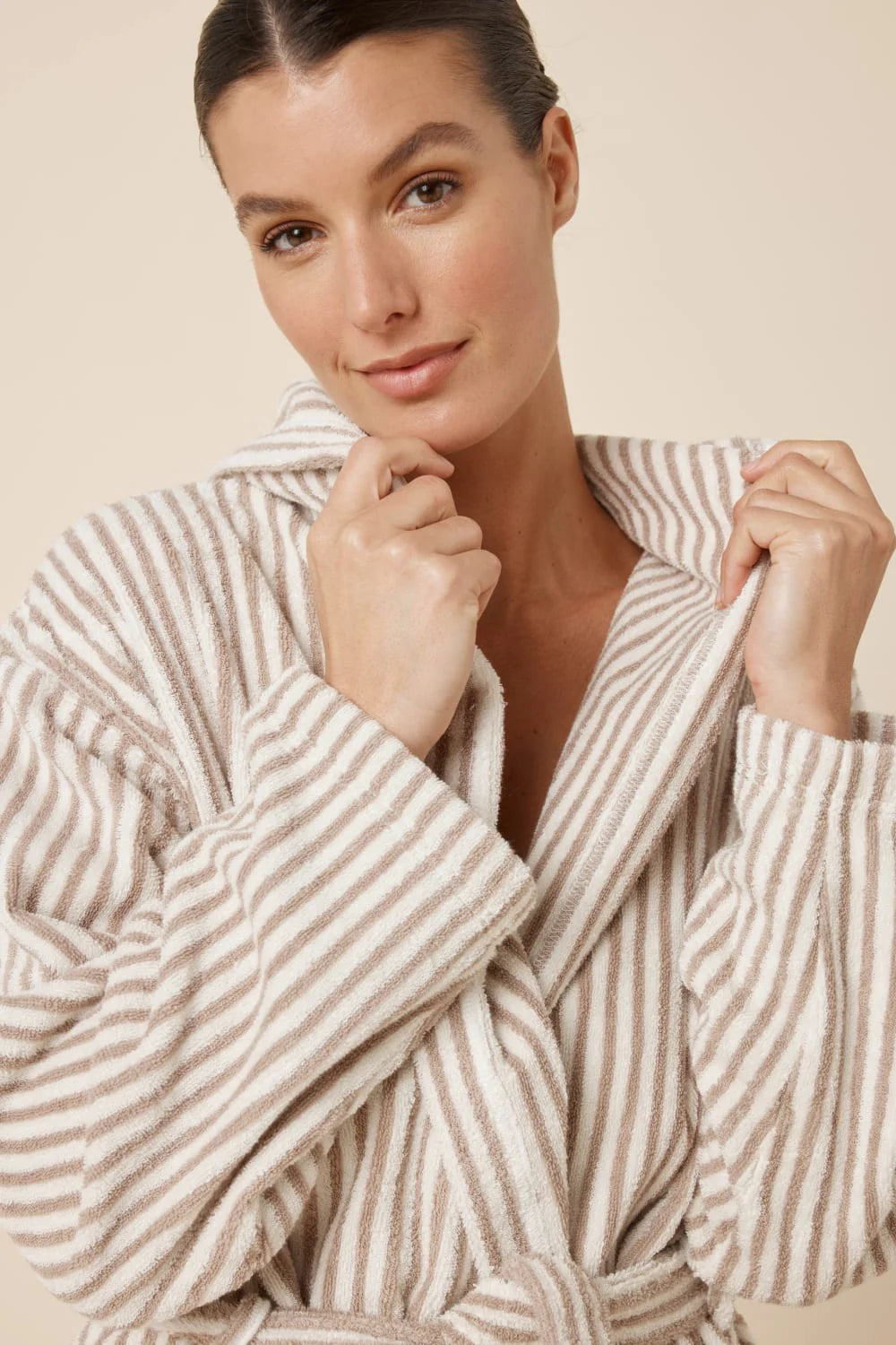 Ginger Lily Adriana Terry towel robe in biscuit color, soft terry fabric, showcasing its cozy, luxurious sleepwear design with a tie waist.