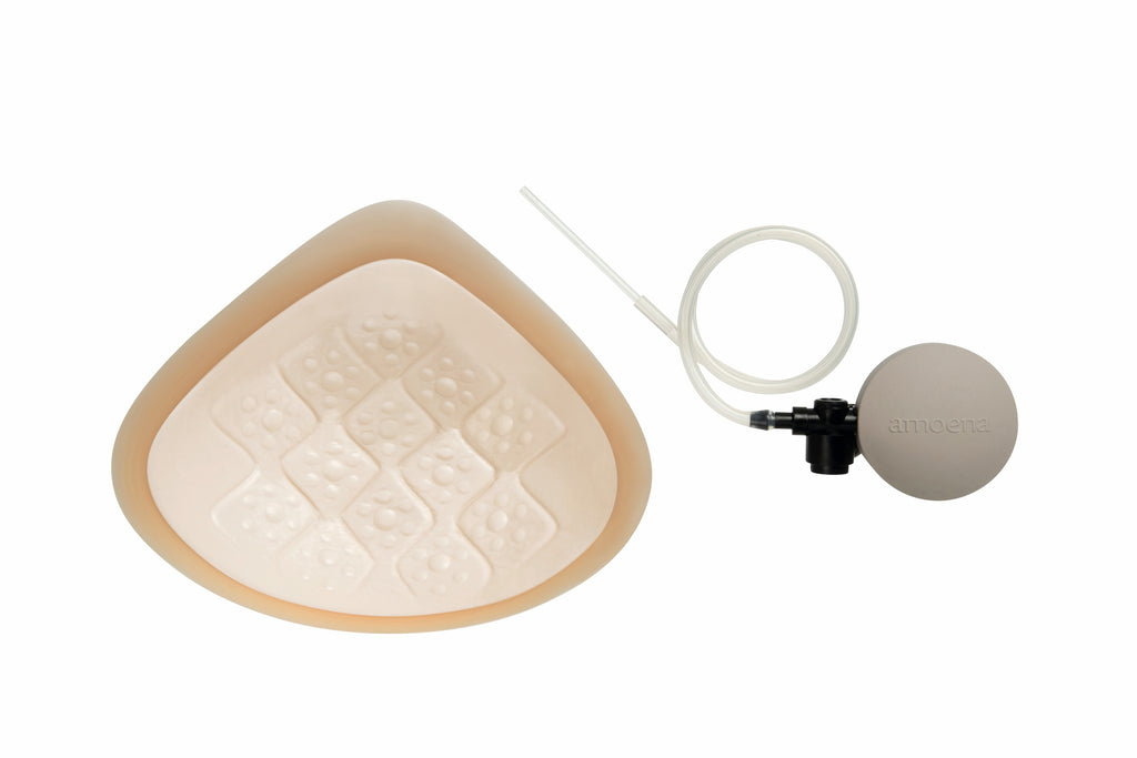 Ivory Balance Adapt Air Medium Delta breast form from Amœna's Mastectomy Range, designed for comfortable, natural fit post-mastectomy.