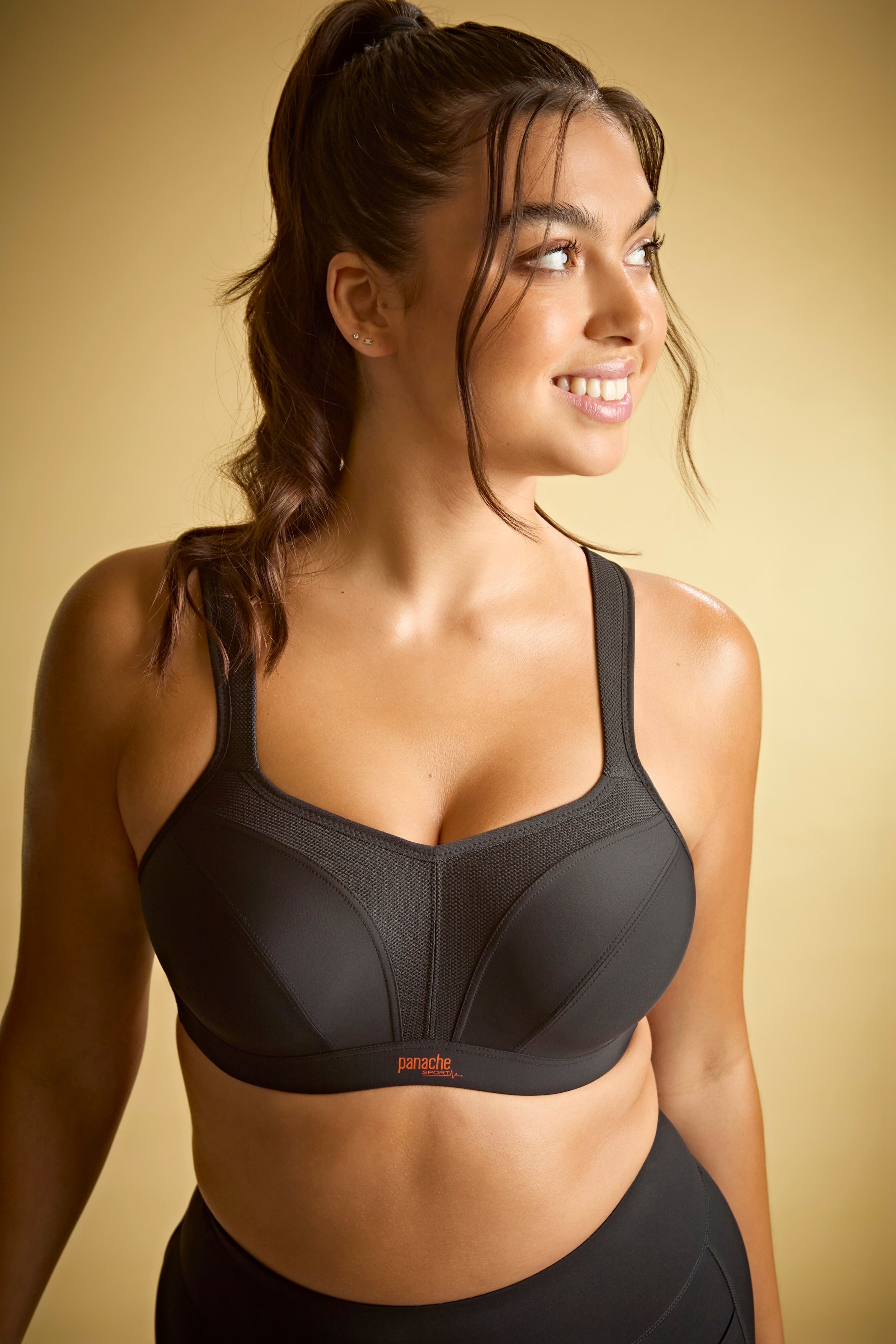 Black underwire sports bra by Panache with supportive design and adjustable straps, ideal for active wear.