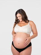 Show Off maternity bra in ivory by HOT MILK, featuring soft fabric and supportive design for nursing and maternity comfort.