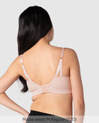 Back view of HOT MILK My Necessity 2.0 FlexFit Nursing Bra in Ballet Pink, showcasing soft fabric and supportive design.