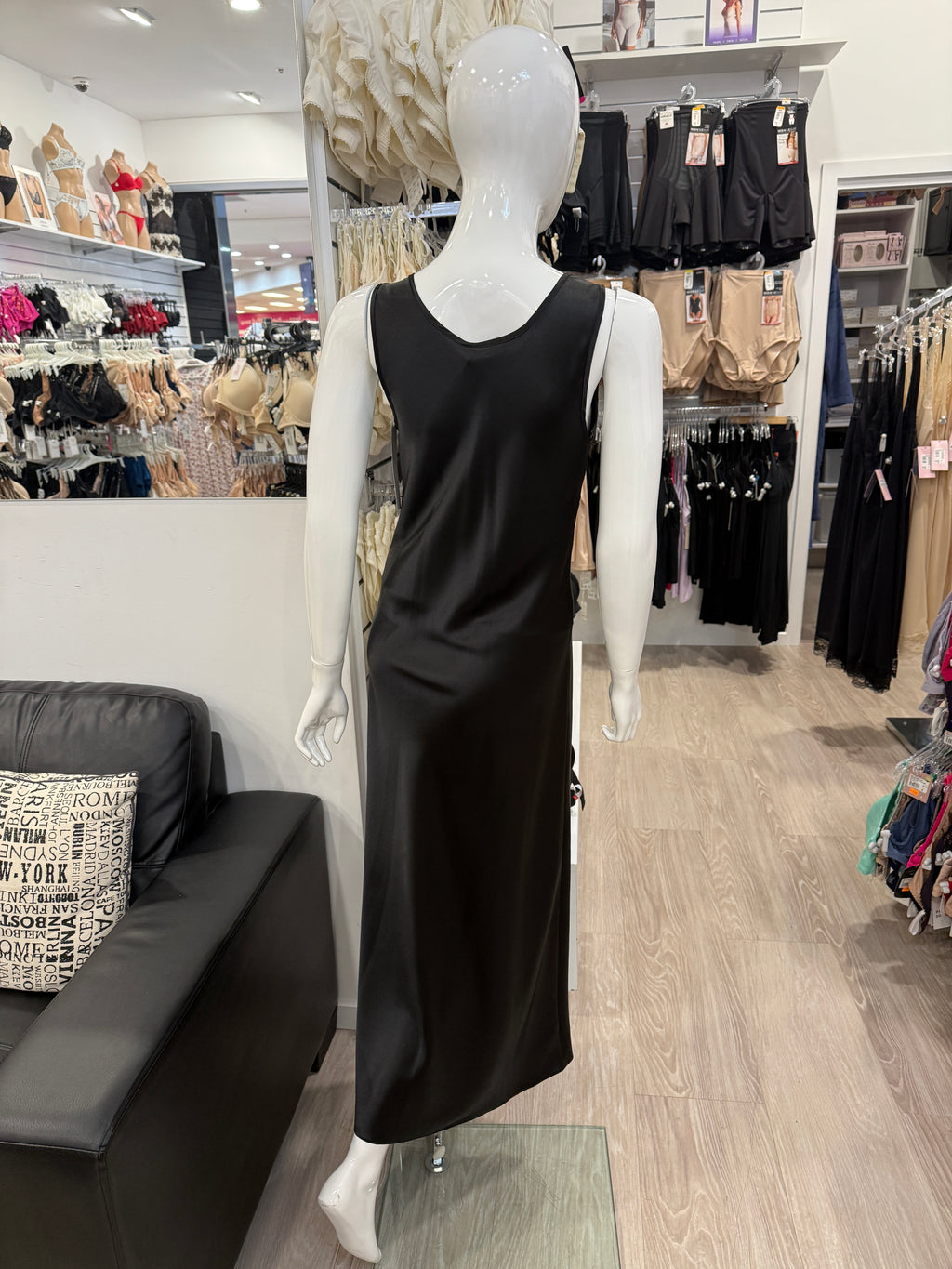 Black satin long nightie from Essence's Beck sleepwear collection, featuring a smooth, luxurious fabric and elegant design.