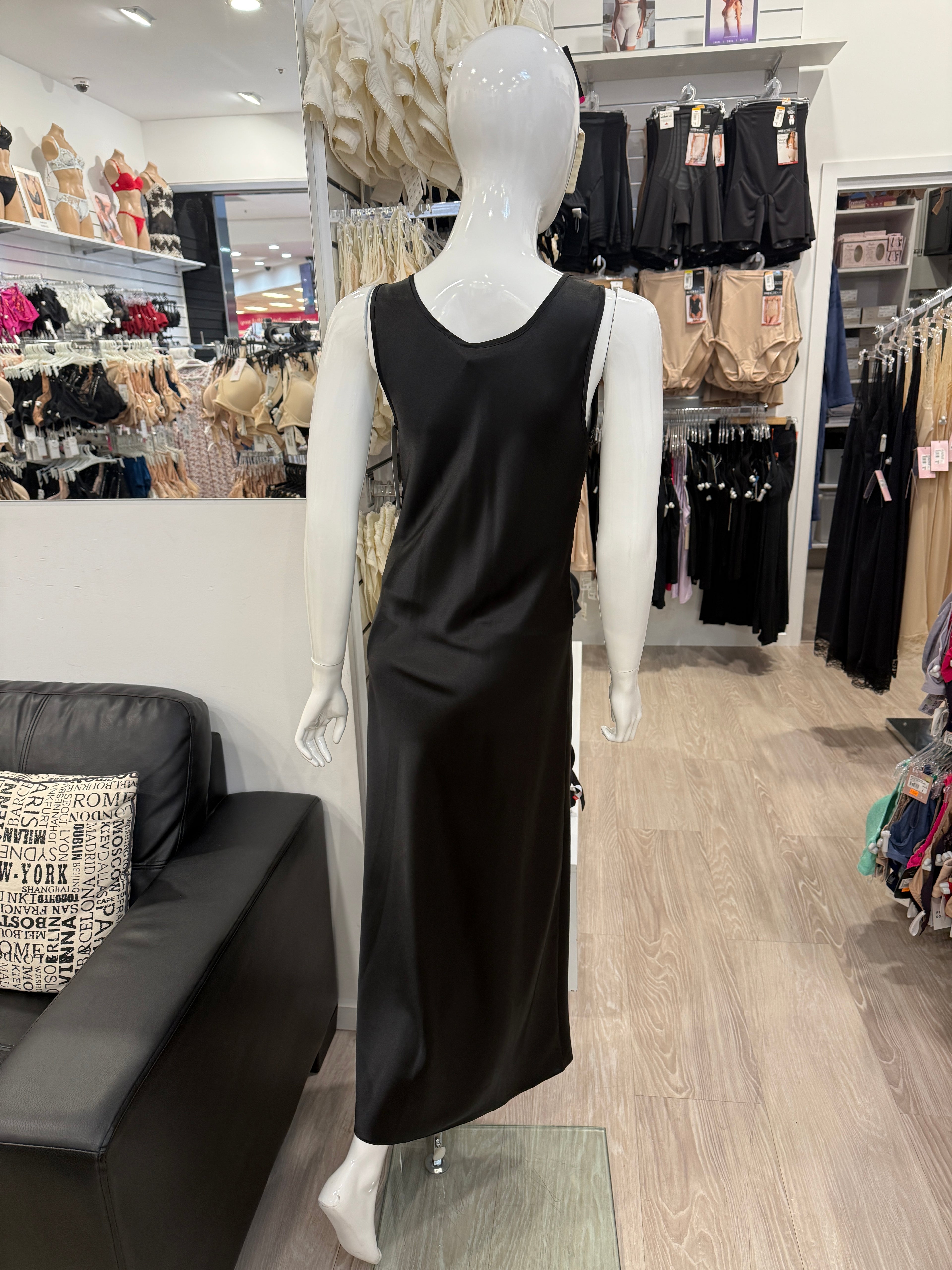 Black satin long nightie from Essence's Beck sleepwear collection, featuring a smooth, luxurious fabric and elegant design.