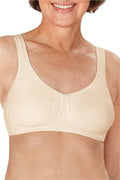 Mona wire-free bra by AMOENA in champagne color, featuring seamless design and comfortable fit, shown on a model.
