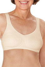 Mona wire-free bra by AMOENA in champagne color, featuring seamless design and comfortable fit, shown on a model.