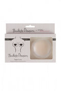 Secret Weapons headlight dimmers nipple covers for low-cut tops, nude color, packaged as discreet accessories for added coverage.
