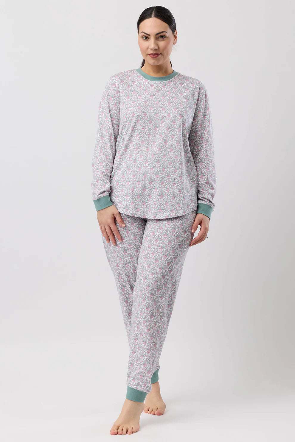 Pink Oriental Ski PJ set by SCHRANK, cozy sleepwear with a playful snowflake and ski pattern, perfect for winter nights.