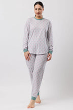 Pink Oriental Ski PJ set by SCHRANK, cozy sleepwear with a playful snowflake and ski pattern, perfect for winter nights.