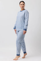 Schrank Oriental Ski pajama set in teal sleepwear with ski-themed pattern, cozy and comfortable for lounging or sleeping.