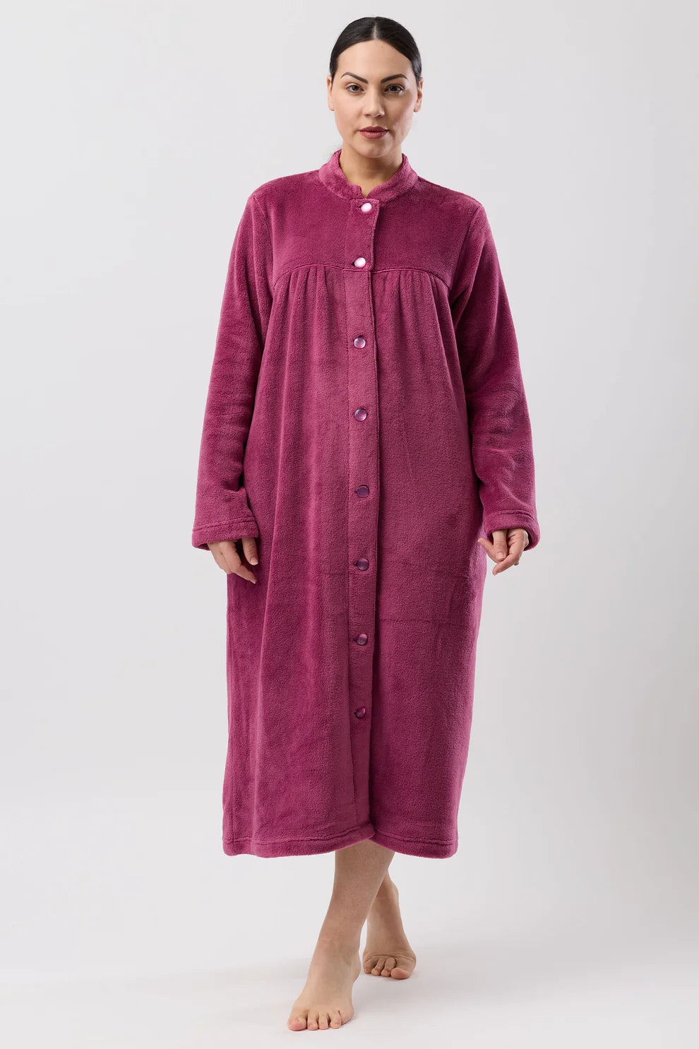 Schrank fleece button-down dressing gown in berry color, mid-length sleepwear with cozy, soft fabric and front buttons.