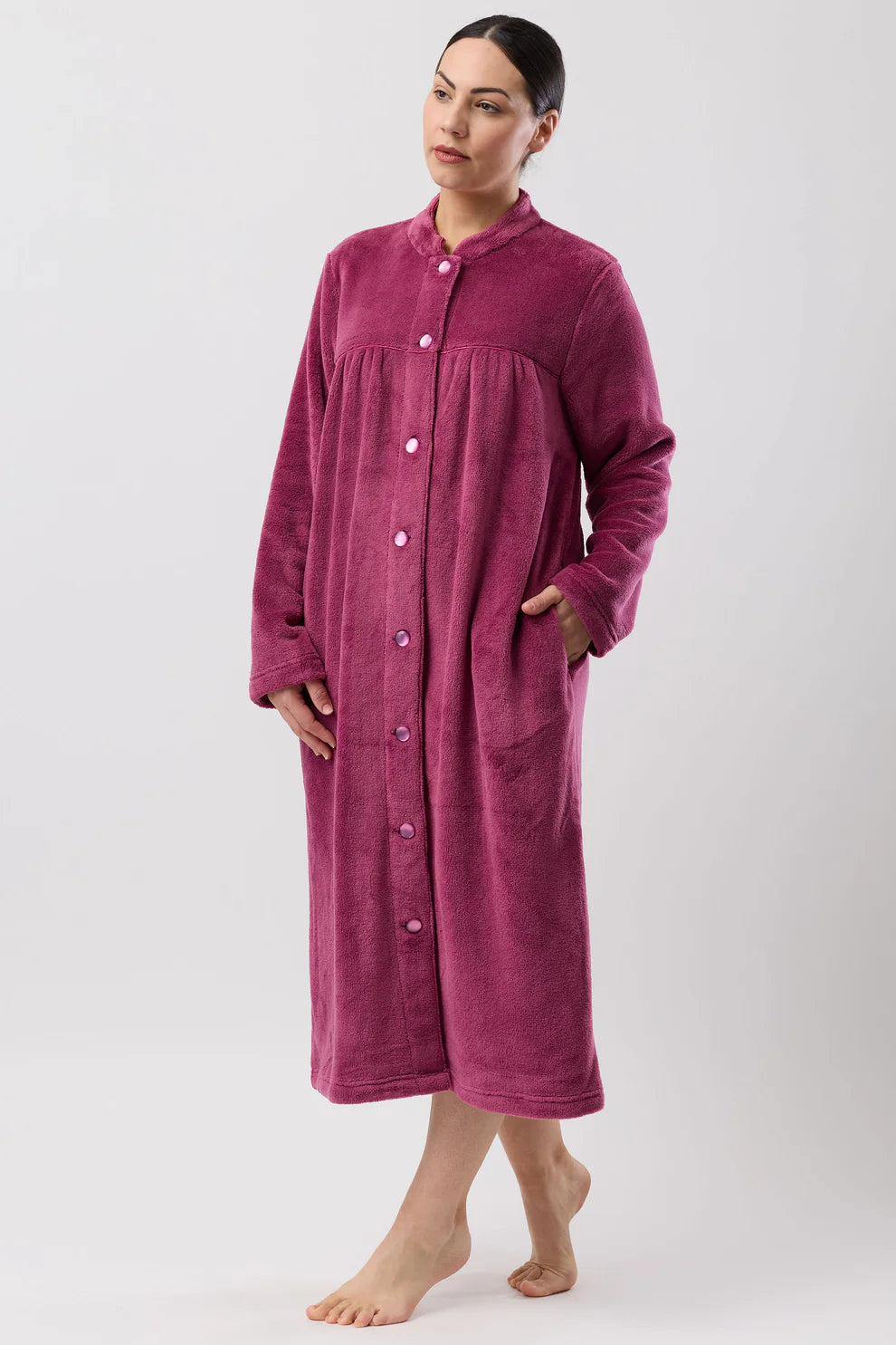 Berry-colored Schrank fleece button-down dressing gown, mid-length sleepwear with a cozy, soft fabric and button-front design.