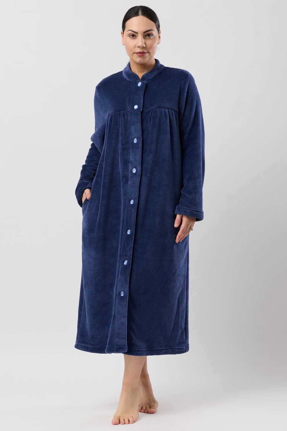 Navy fleece button-down dressing gown by Schranks, mid-length sleepwear with front pockets and cozy collar, ideal for relaxed comfort