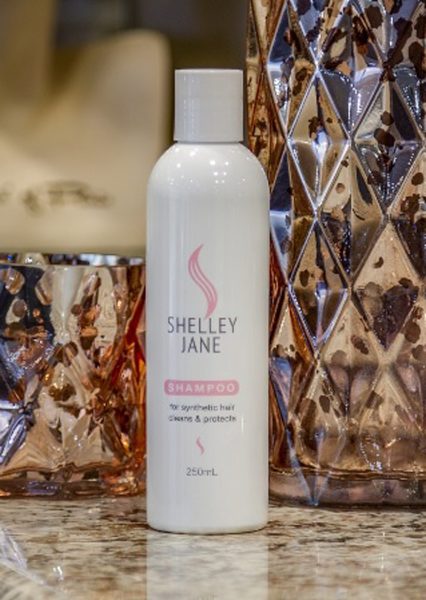STARKLES Shampoo for synthetic hair wigs, featuring gentle cleansing formula for shiny, clean synthetic wig fibers.