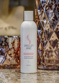 STARKLES synthetic hair wig conditioner applied to a Shelley-Jasne wig, showing smooth, shiny synthetic hair.