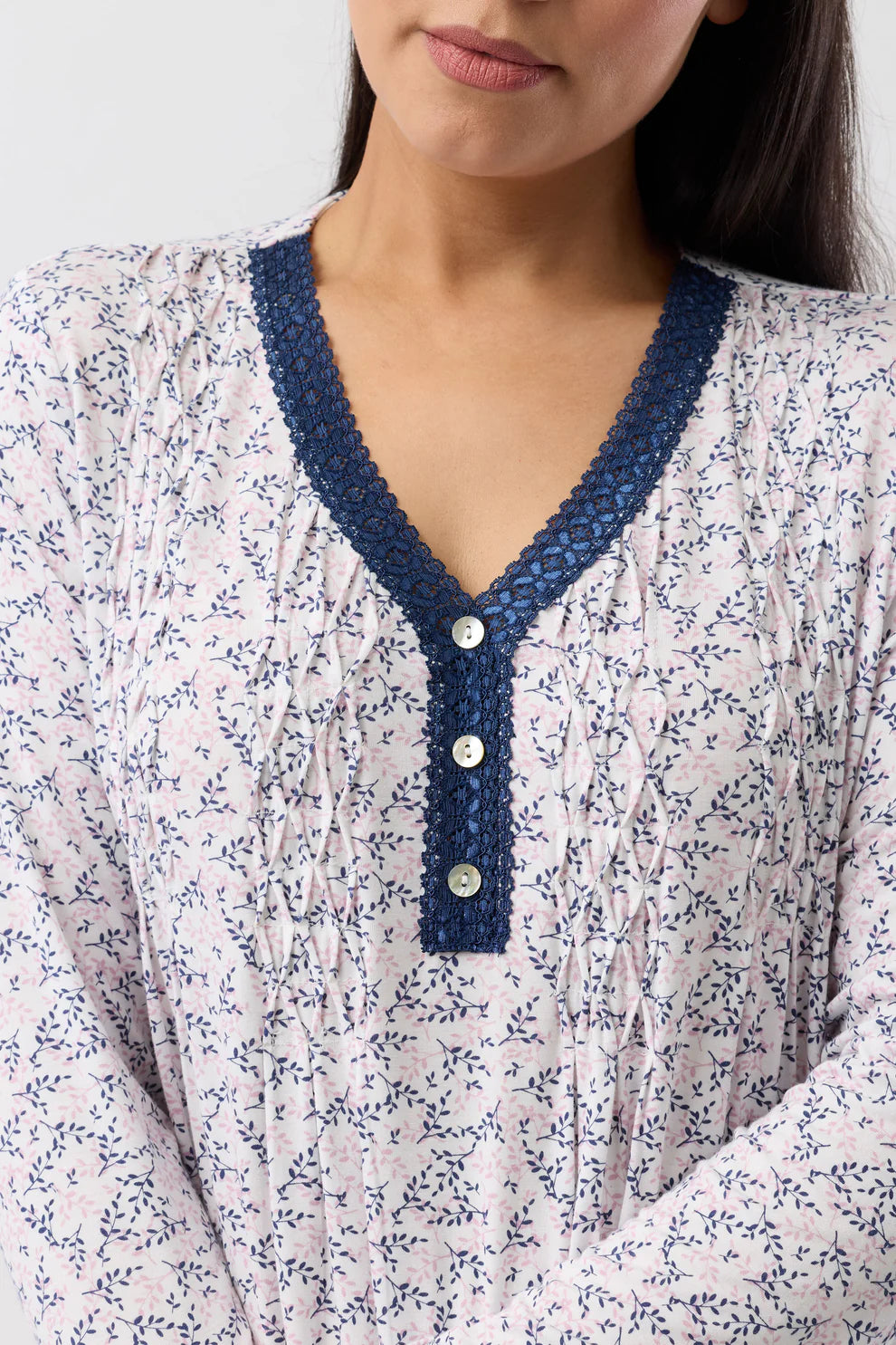 YUU Jardin Smocking Nightie in navy sleepwear, featuring soft fabric, delicate smocking details, and a comfortable fit.