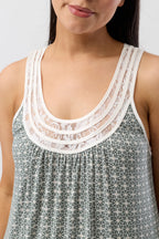 YUU Geo Chemise sleepwear in olive color, soft fabric with a relaxed fit, displayed on a hanger.