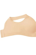 Nude Linda bra crop top by Amoena, available in size L, shown in a close-up of the soft fabric and seamless design.