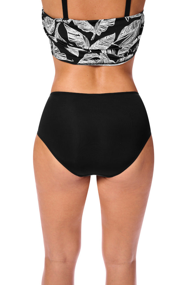 Black and white Lanzarote swim briefs for mastectomy, available in sizes 14 and 20, by AMOENA.