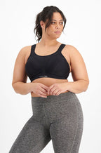 Black wirefree sports bra by Berlei with adjustable straps and breathable fabric in size D cup