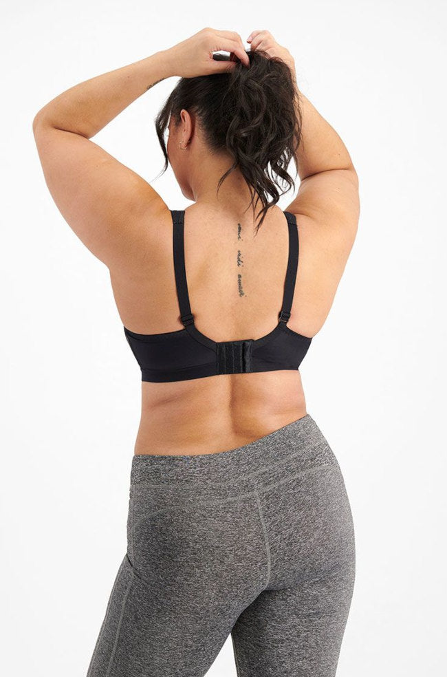 Berlei black wirefree sports bra with D cup support and adjustable straps, ideal for activewear.