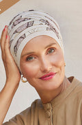 Pink Shanti Turban hat by Christine Headwear featuring a vibrant blooming pink design and comfortable, stylish fit.