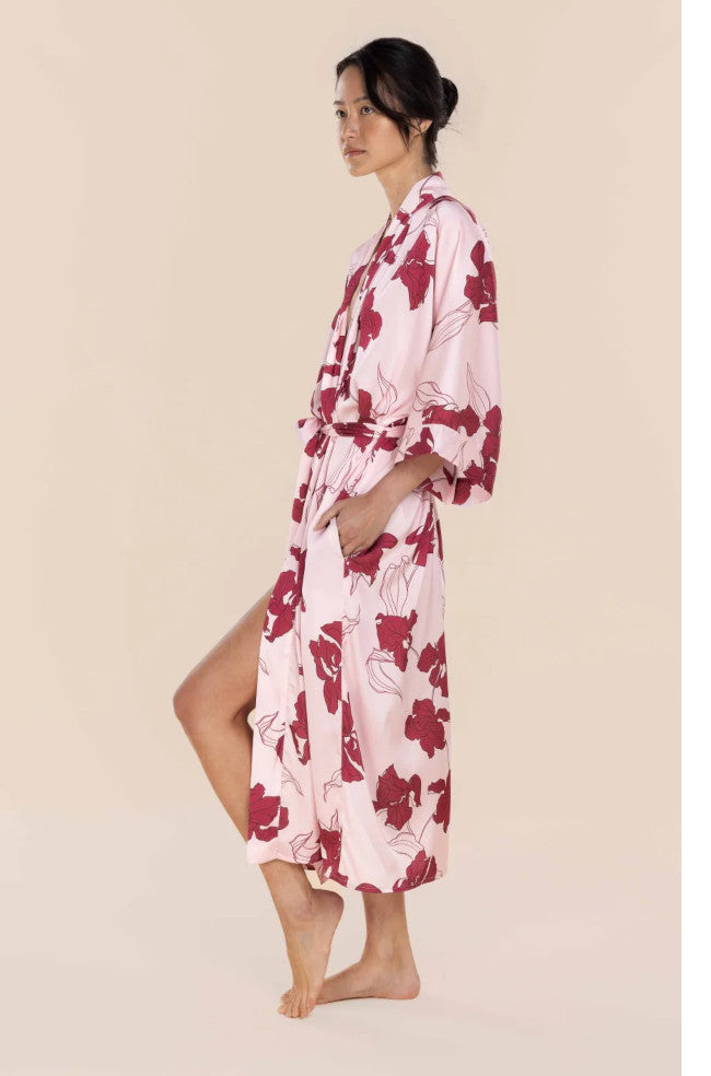 Daisy pink satin long robe made from recycled polyester with Iris print and adjustable waist, by Ginger Lily.