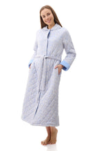 Givoni Allegra blue quilted cotton long sleeve dressing gown, available in size M, shown in a cozy sleepwear setting.