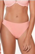 Seamless coral G-string thong by Lingadore, designed for comfort with no visible panty lines