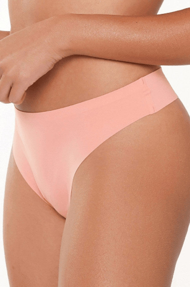 Seamless coral G-string thong by LINGADORE, featuring no panty line design for all-day comfort.