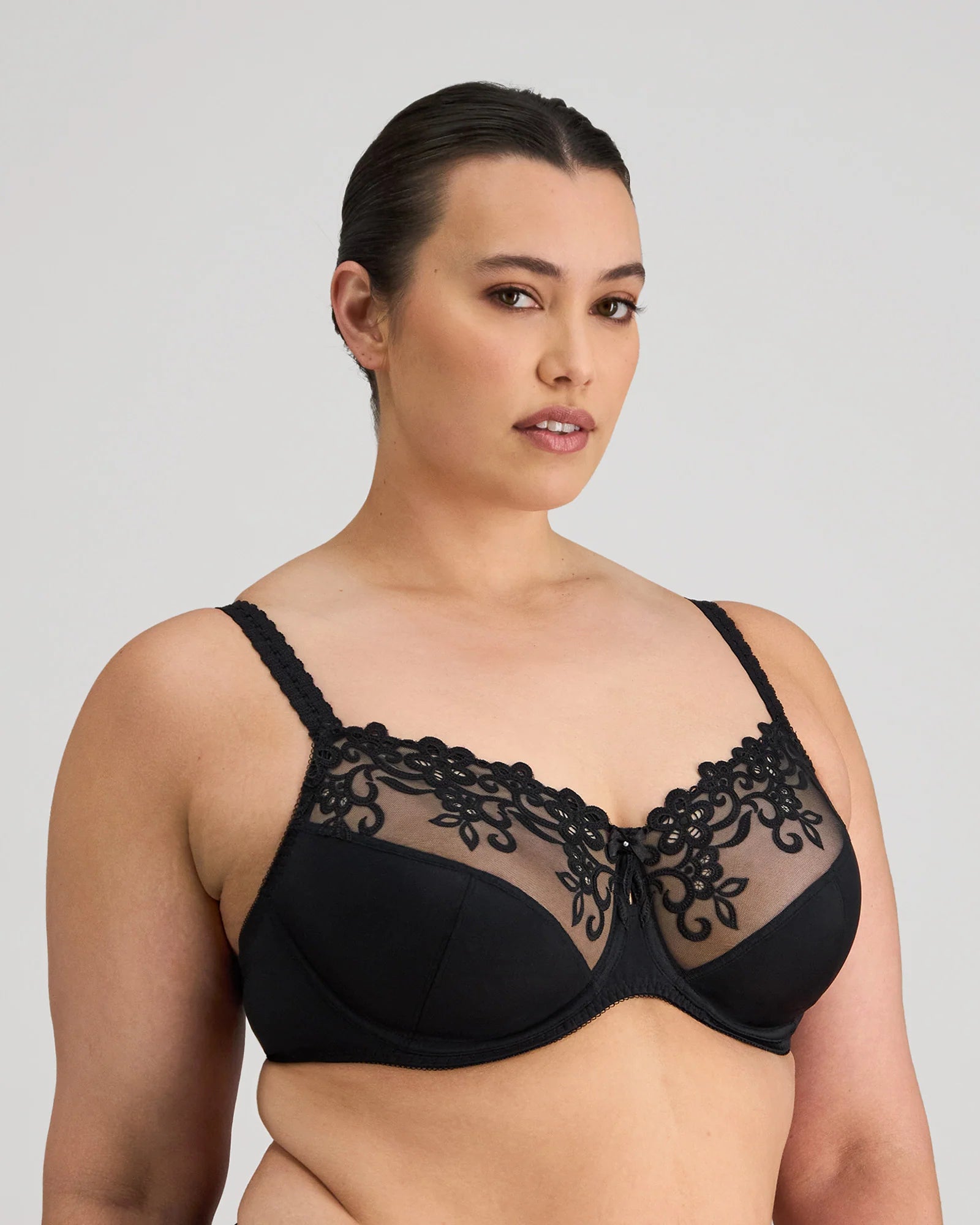 Black Coral Underwire Bra by FAYREFORM with supportive underwire, smooth fabric, and adjustable straps for a comfortable fit.